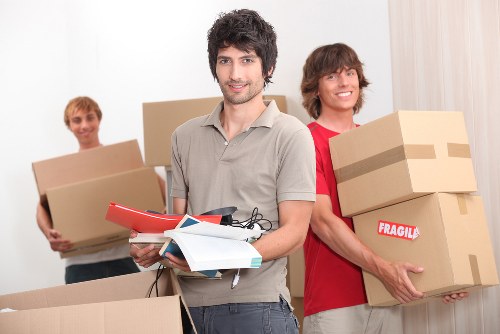Staff assessing risks before lifting items