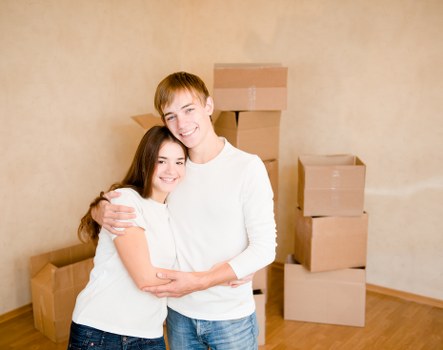 Moving team loading furniture into a truck