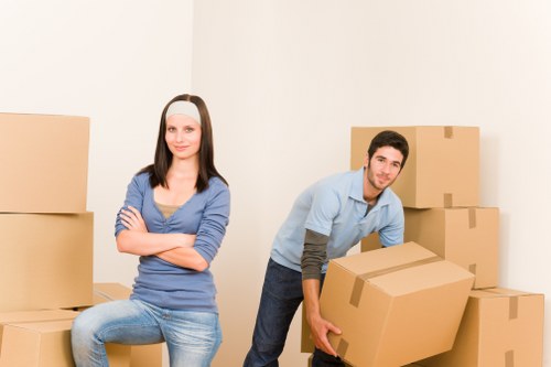 Local packers organising belongings in a Hackney flat