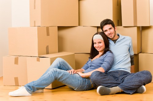 Packed boxes and furniture prepared for a local removal van service
