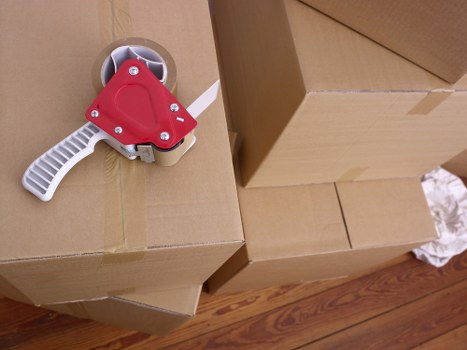 Loading furniture and boxes into a van for a Hackney move