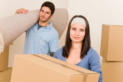 Packed moving boxes and furniture ready for transport
