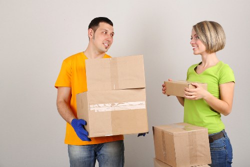 Packed boxes and furniture ready for a house move in Hackney