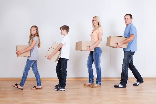 Packed boxes and wrapped furniture ready for transport
